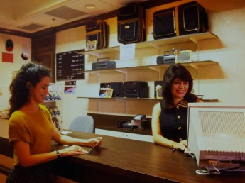 a customer ordering from someone on a desktop computer